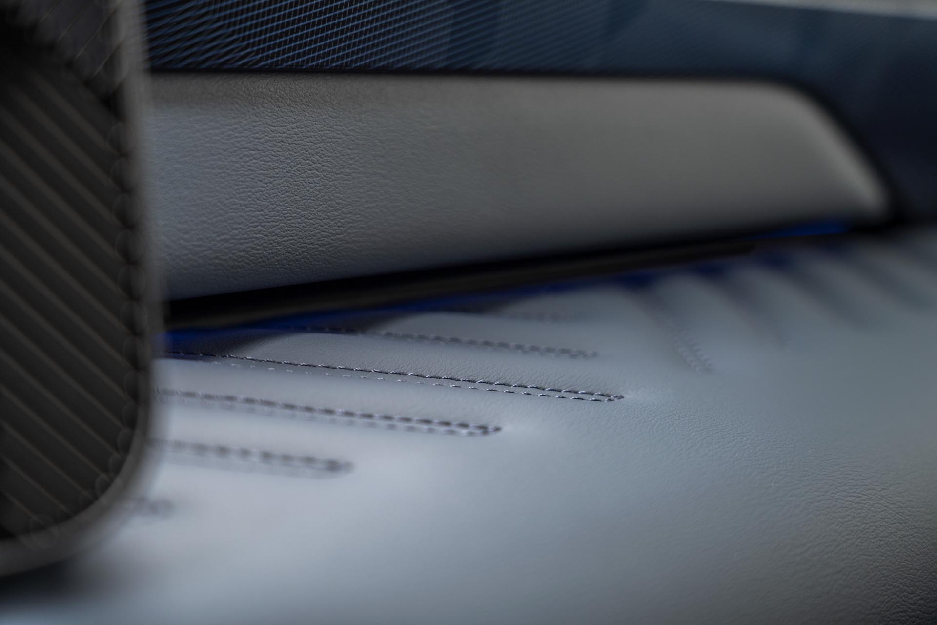 detailed shot of leather stitching and texture on dashboard