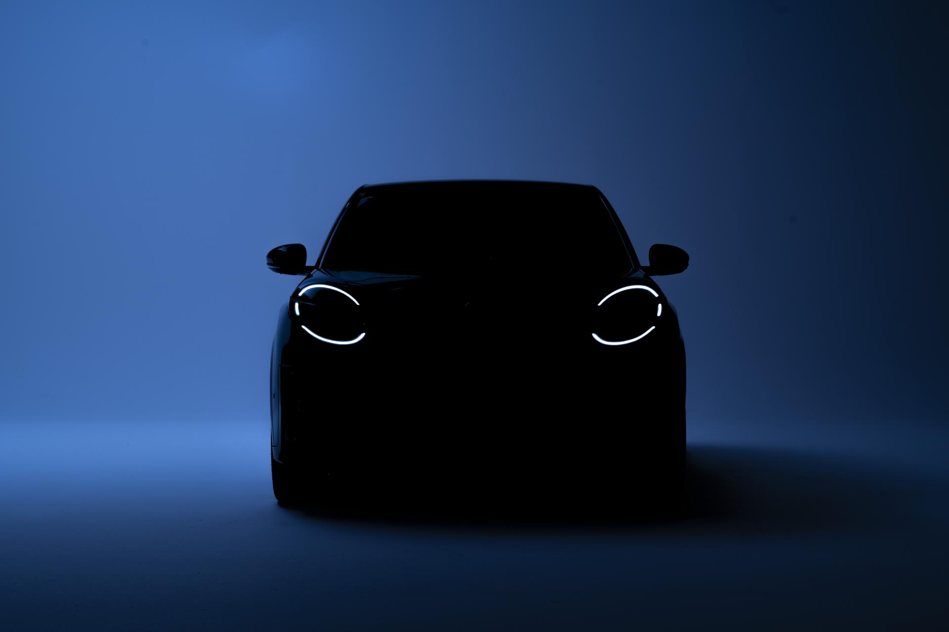 teaser image of All new Nissan Micra in the dark with only led signature headlamps in front on 8v2H2kl